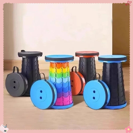Set of colorful spool stools on a wooden floor.